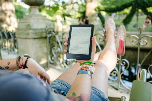 Person reading an eBook on a tablet